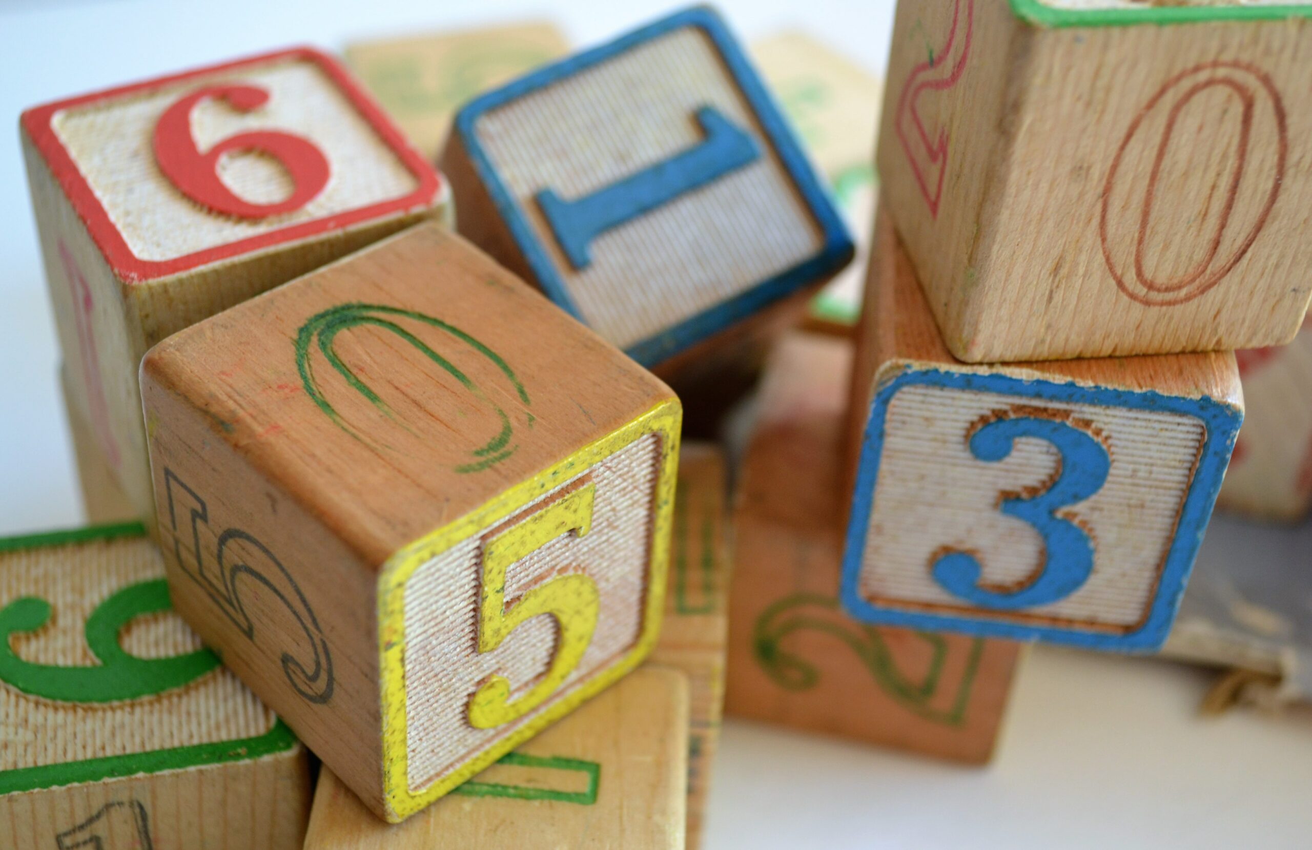 Wooden numbered blocks in stacks for training data metrics