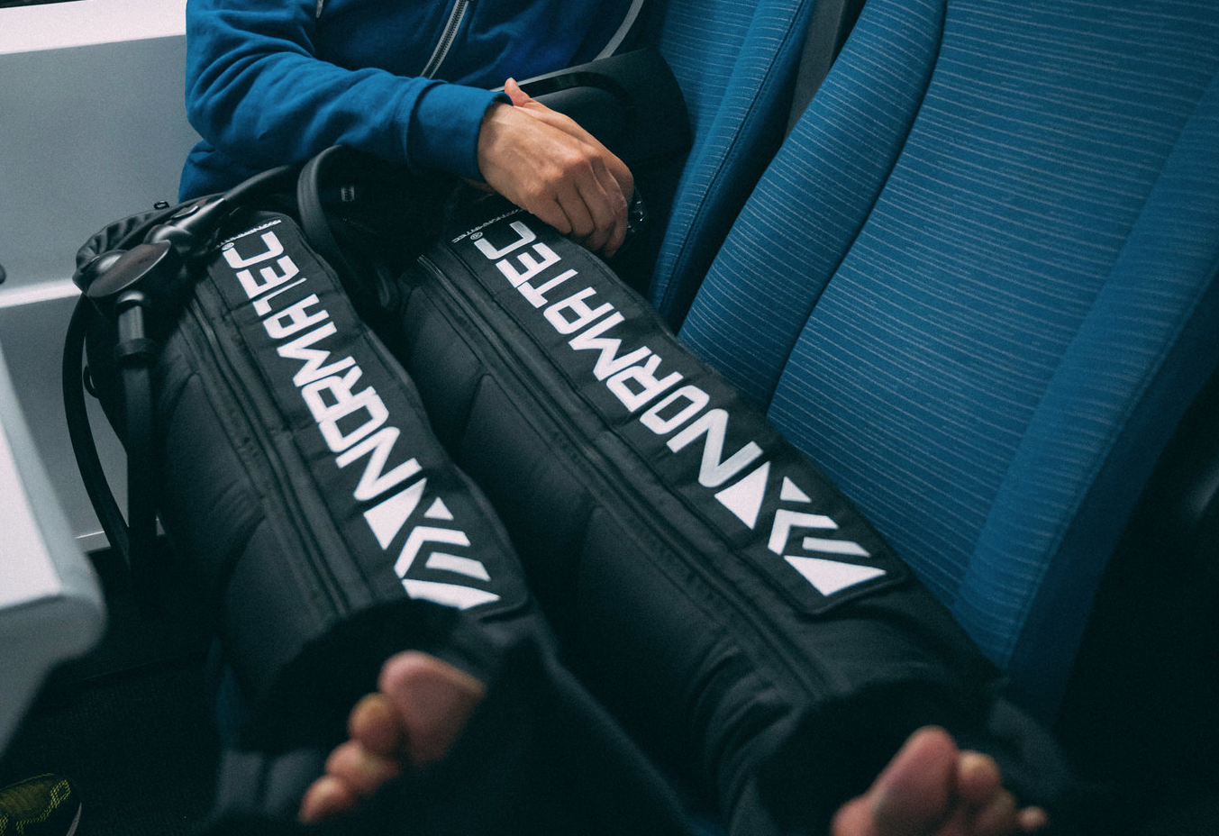 Wearing Normatec recovery boots