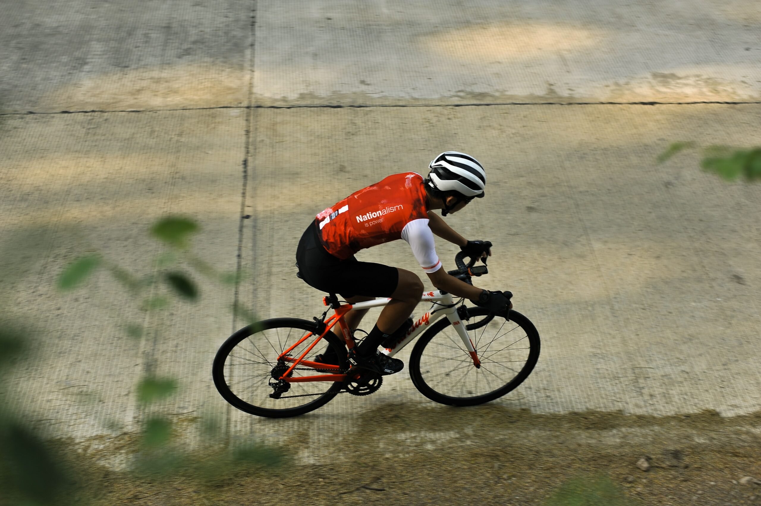 Cyclist on pavement for cycling interval training