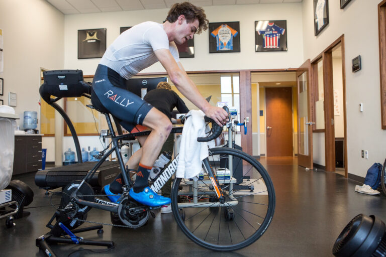 Sepp Kuss cycling physiology testing on a standing bike