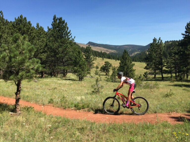 A mountain biker rides a trail at Joder Ranch
