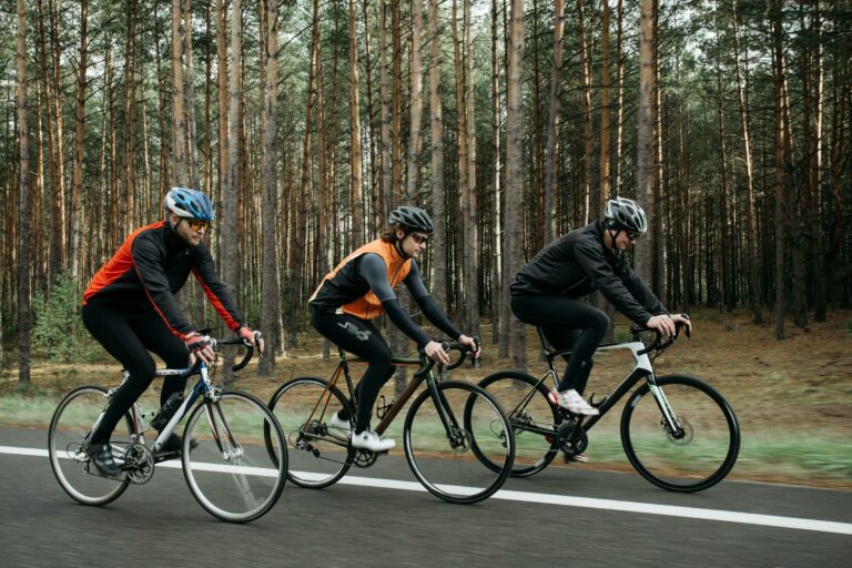 trio of cyclists on a rural road
