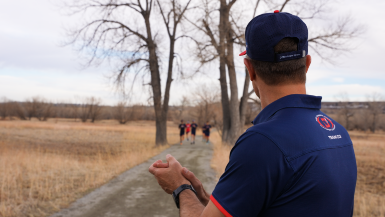 Coach Mike Ricci coaching triathletes