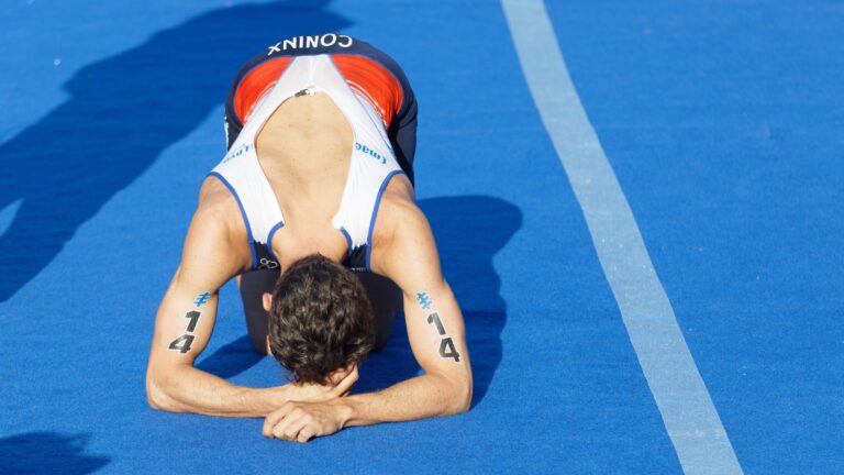 Dorian Coninx is exhausted after crossing the finish line of the 2017 Men's ITU World Triathlon series event in Stockholm, Sweden.