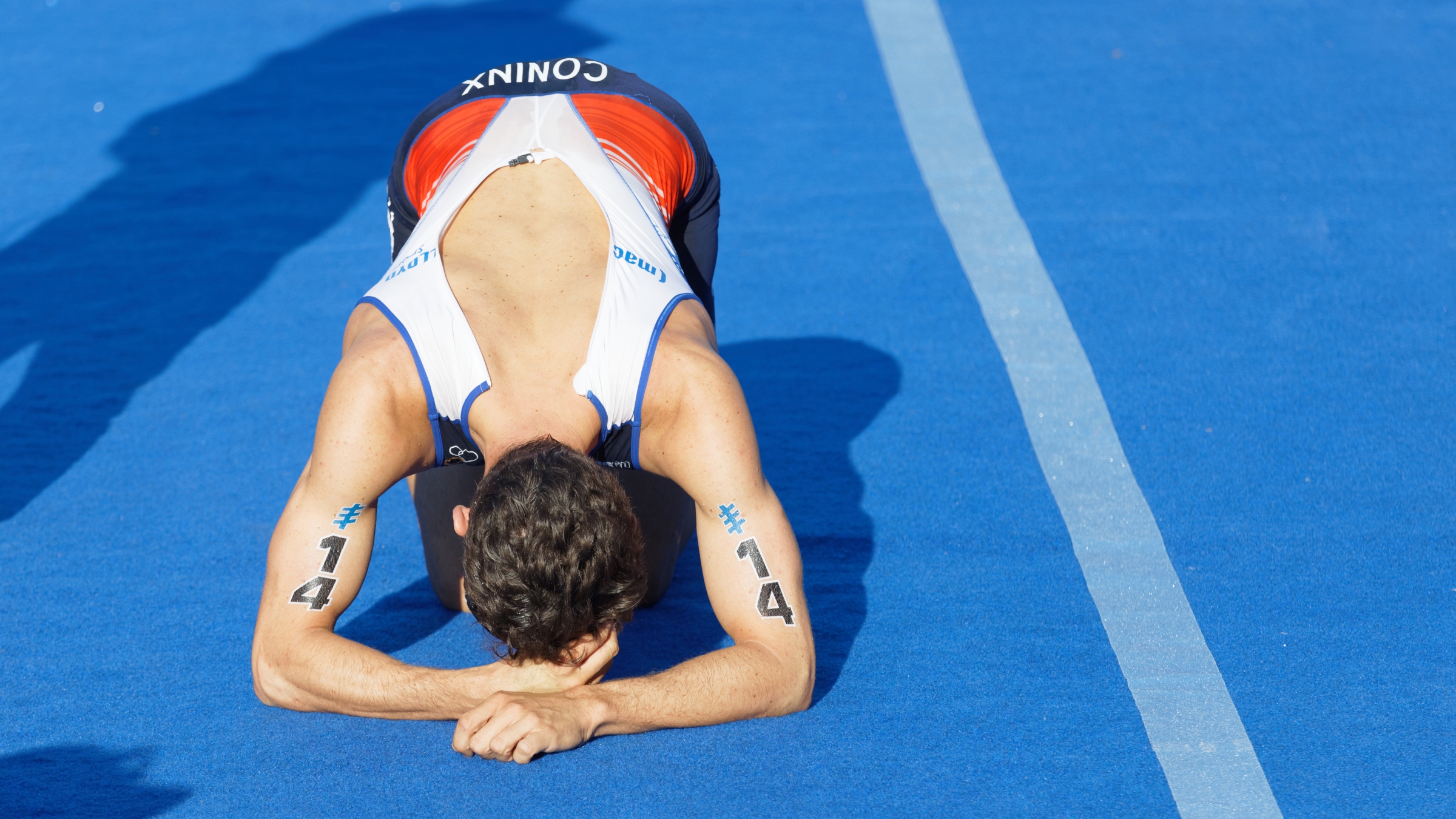 Dorian Coninx is exhausted after crossing the finish line of the 2017 Men's ITU World Triathlon series event in Stockholm, Sweden.