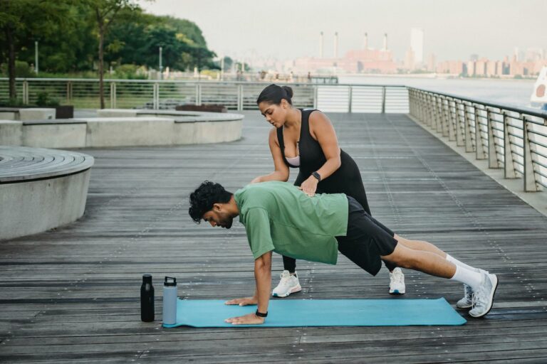 Two people doing yoga