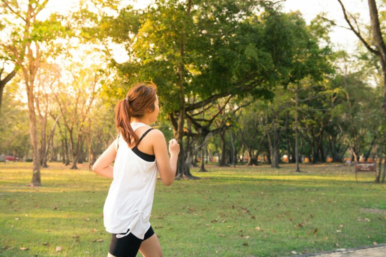 female runner in a park