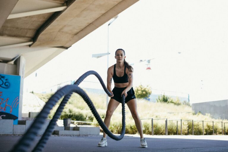 woman working out with ropes